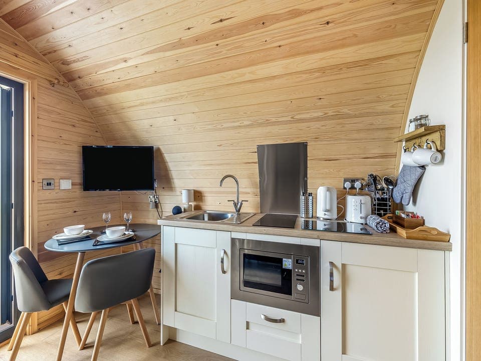 Kitchen/diner | Dyfi - Glampio Ger Y Gors Glamping, Talybont, near Borth