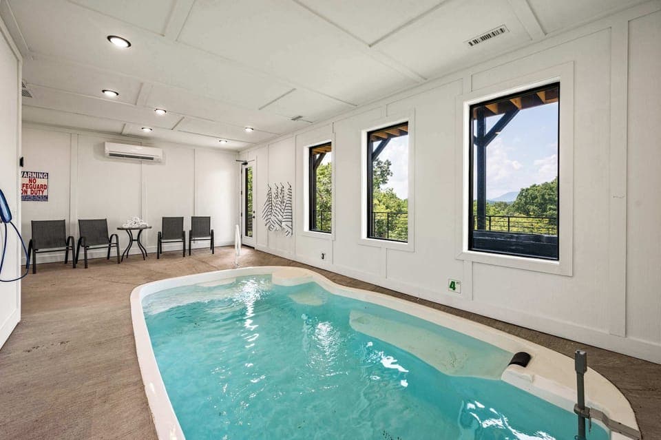 Indoor pool room located downstairs