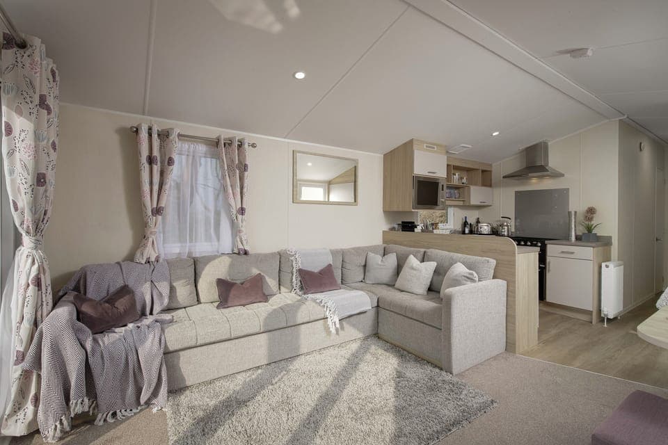 Cosy living room with stunning views and modern amenities. Free WiFi & Netflix!