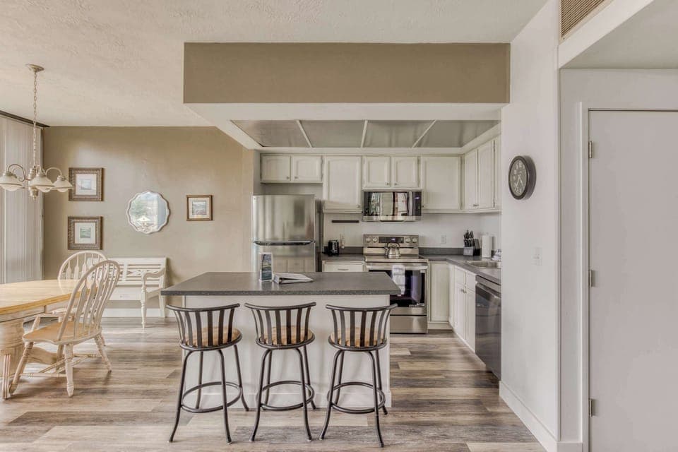 Open kitchen and floor plan create a seamless space where everyone can cook, dine, and connect.