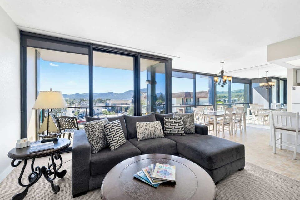 Gather and connect! Open living area flows into dining, perfect for socializing and enjoying the views.