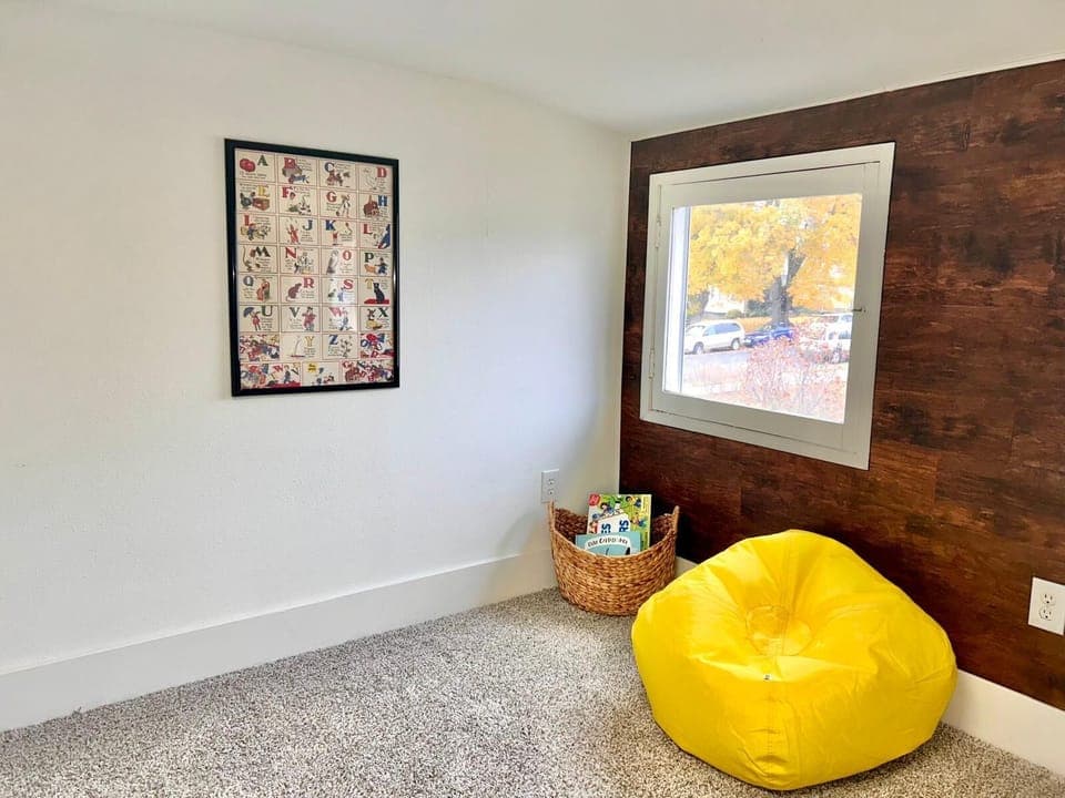 Family-friendly play space with books, board games, and toys!