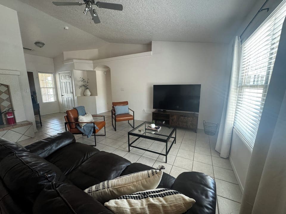 Spacious Living Room with 65-Inch QLED TV