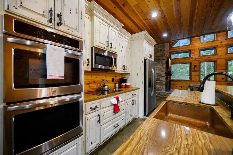 Whip up delicious meals and warm treats with ease—our cabin’s kitchen oven is your culinary companion.
