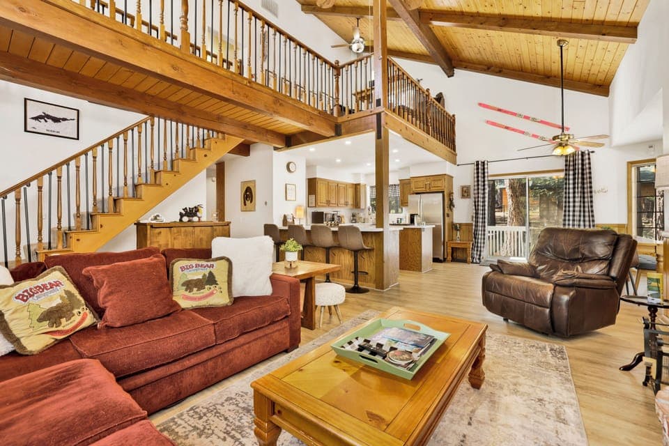Spacious welcoming living room opens to dining area and kitchen
