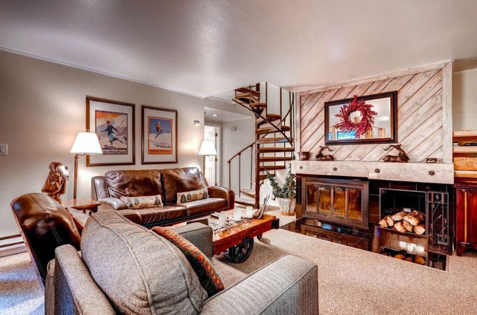 Elegant living room with a cozy fireplace and tasteful decor.