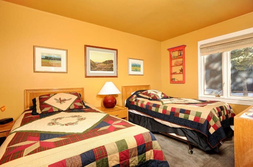 Twin bedroom with natural light.