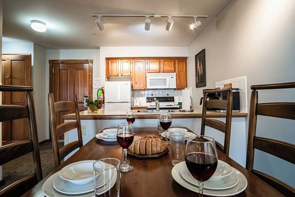 Dining table with seating for four people.