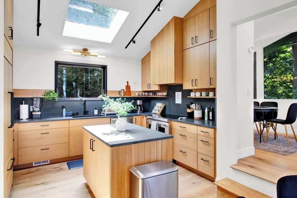 Modern beautiful kitchen, fully stocked with amenities: coffee, tea, spices, olive oil and more.