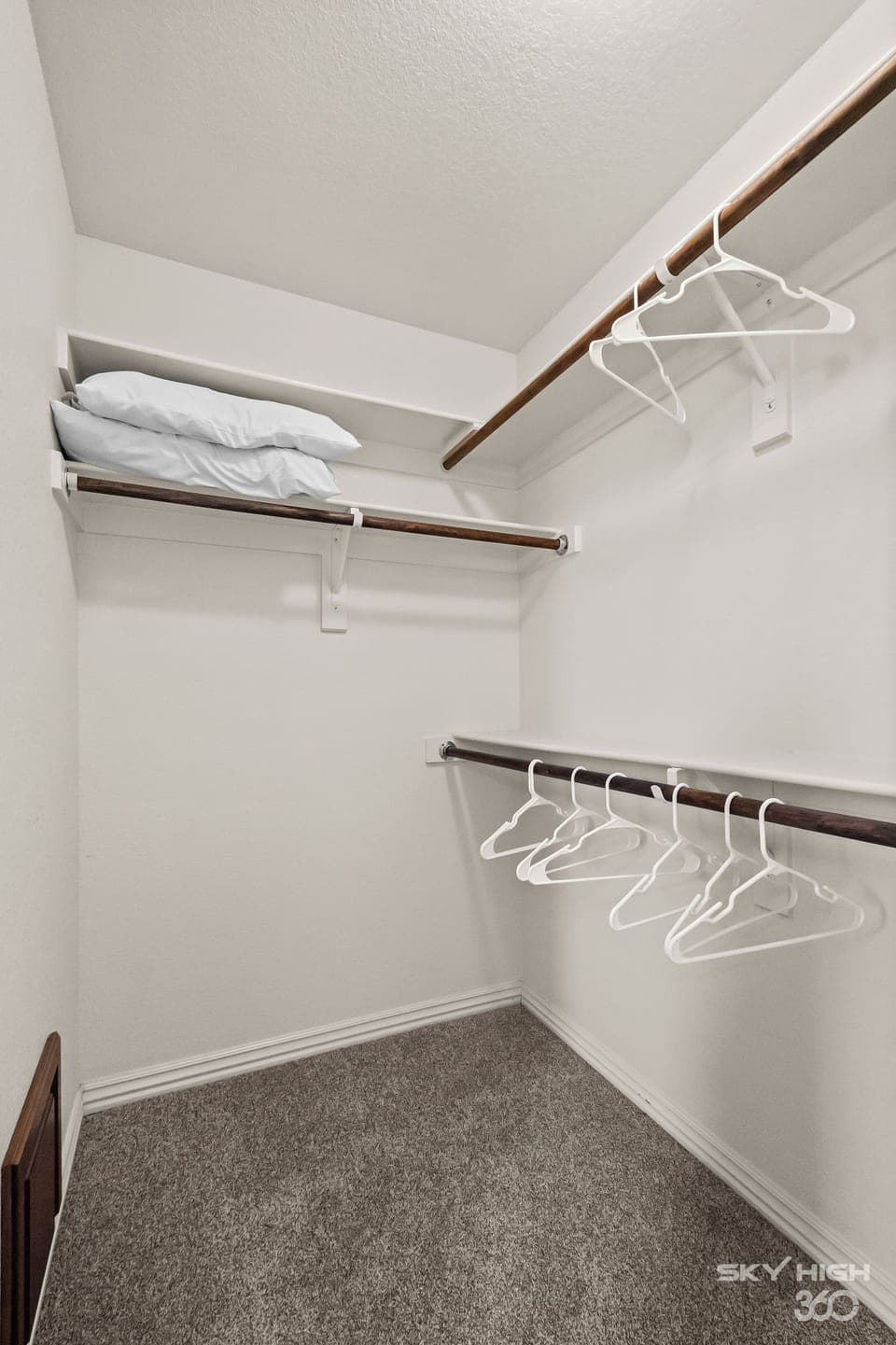 Primary bedroom walk in closet!