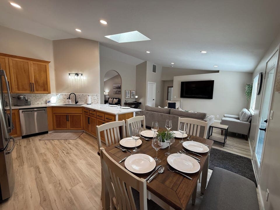 Eat in style at this cozy table for 6 with 3 additional bar seats.  