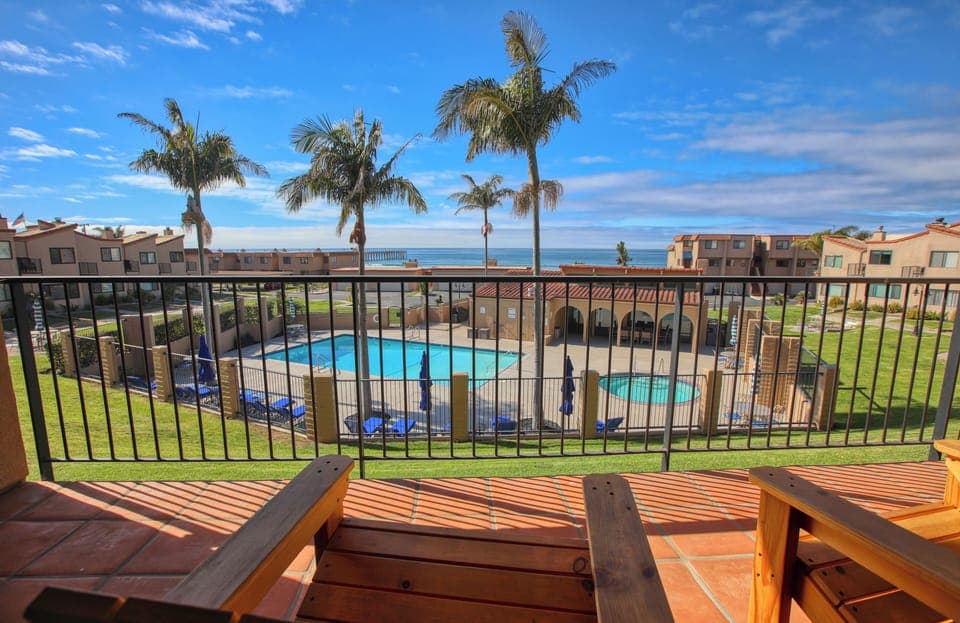 Nestled just steps from the sand, this charming condo offers the perfect spot to unwind and soak up the coastal vibes