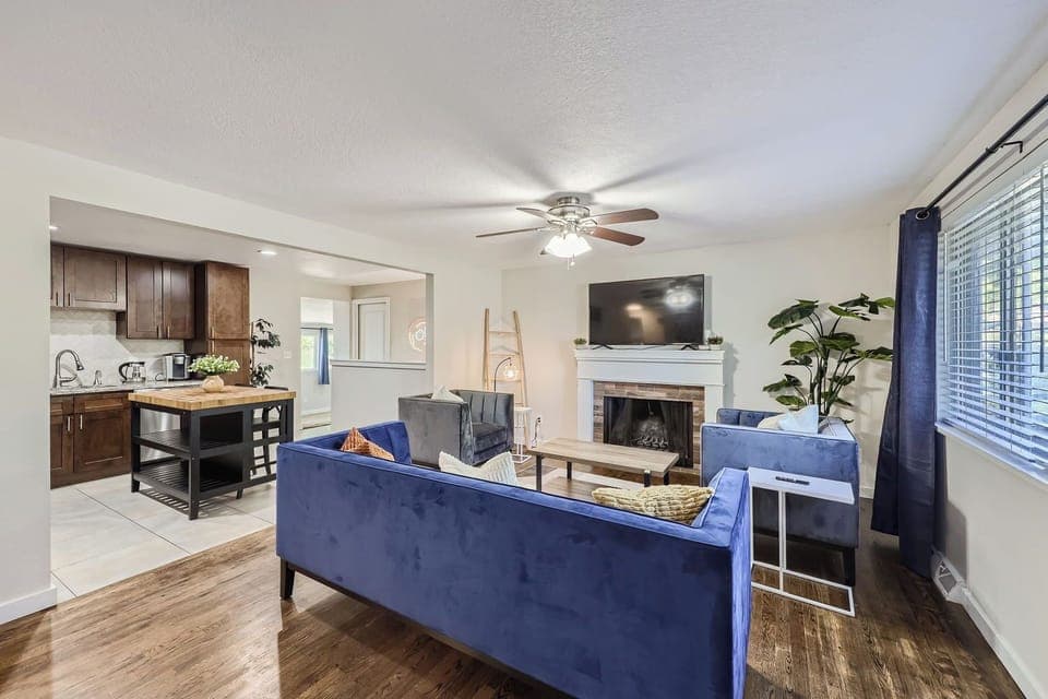 The living room is nearby the kitchen