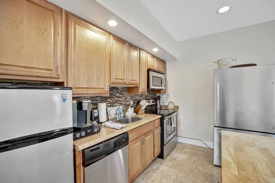 Well-appointed kitchen with everything needed for cooking and meal preparation.