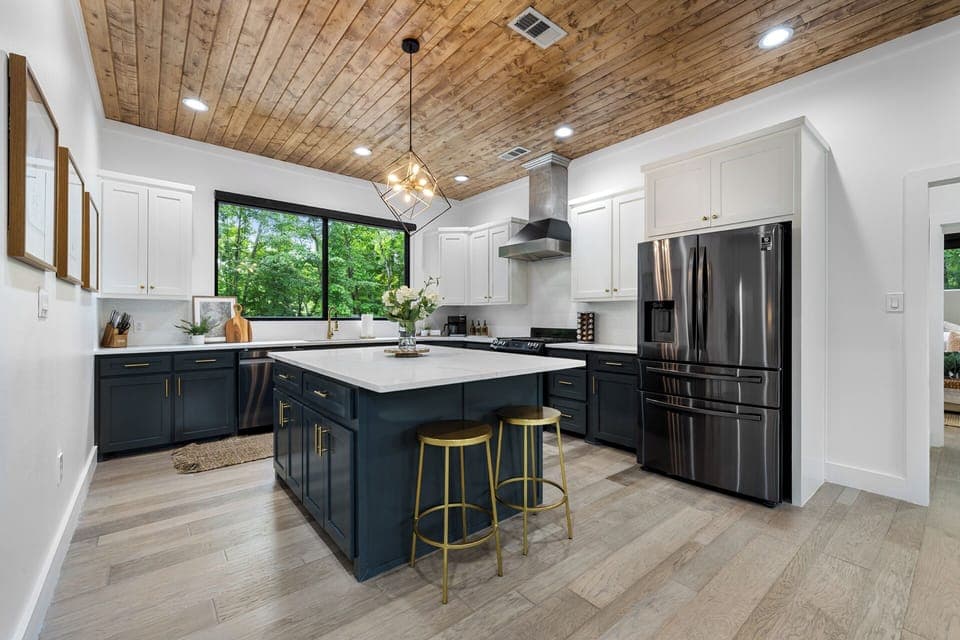 Kitchen: Whip up culinary delights in this stylish space with modern appliances and scenic views!