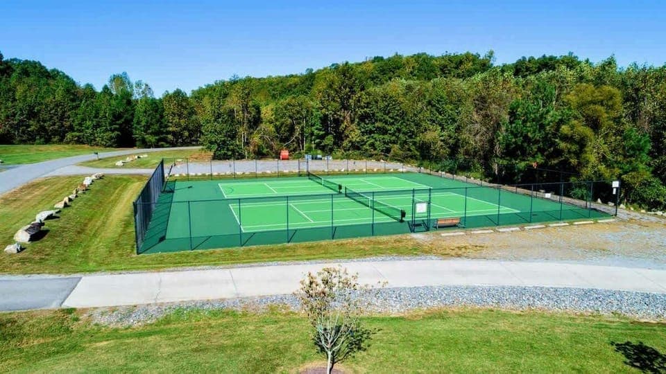 Enjoy access to community swimming pool, tennis courts, pickle ball, beach, and playground.