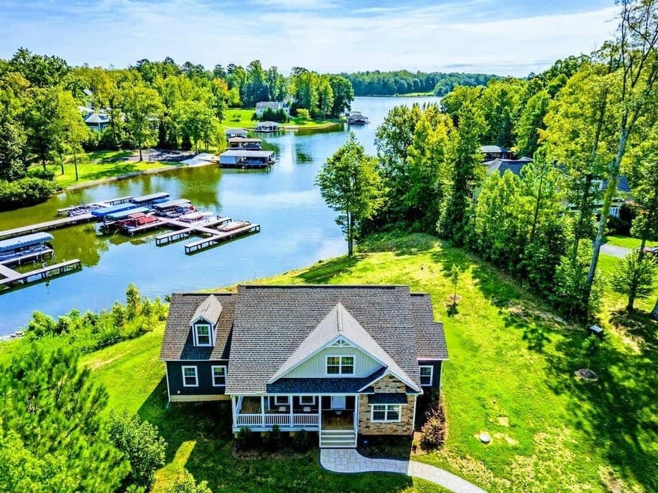 Charming lakefront home with a picturesque view of the water and marina, offering a perfect retreat in nature