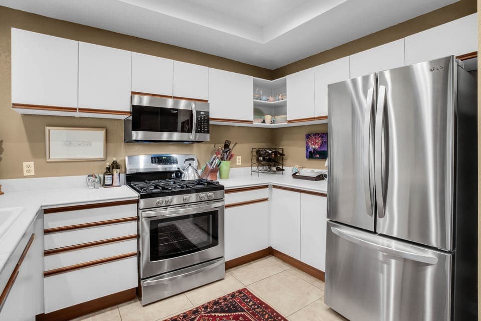 Bright modern kitchen with stainless appliances and ample counter space