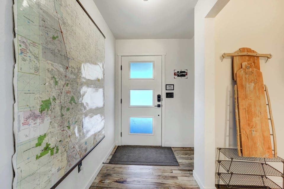 Enter through a charming foyer that welcomes you to your mountain retreat.