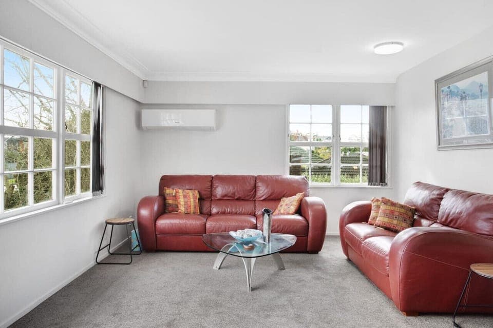 The living room has an air-conditioning unit that keeps it cool in summer and warm in winter.
