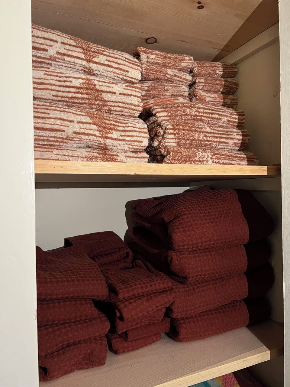 Upstairs closet with linens