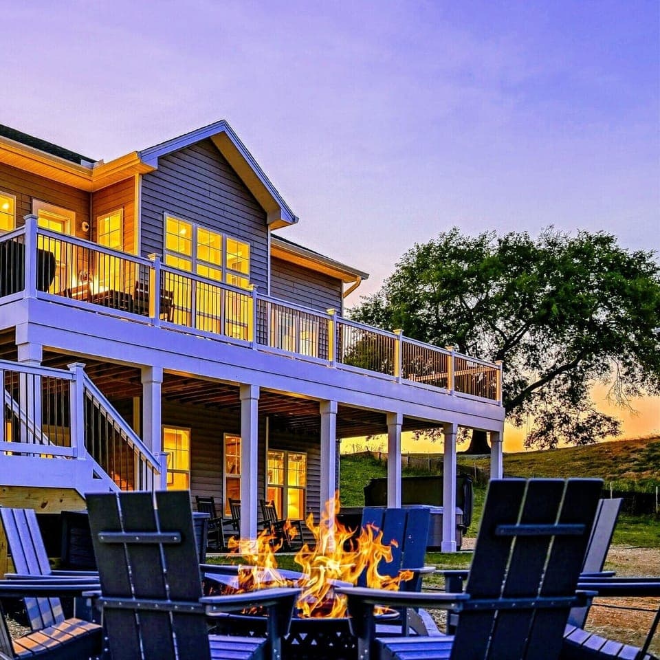 Cozy fire pit on a beautifully lit patio, perfect for evening gatherings and relaxation