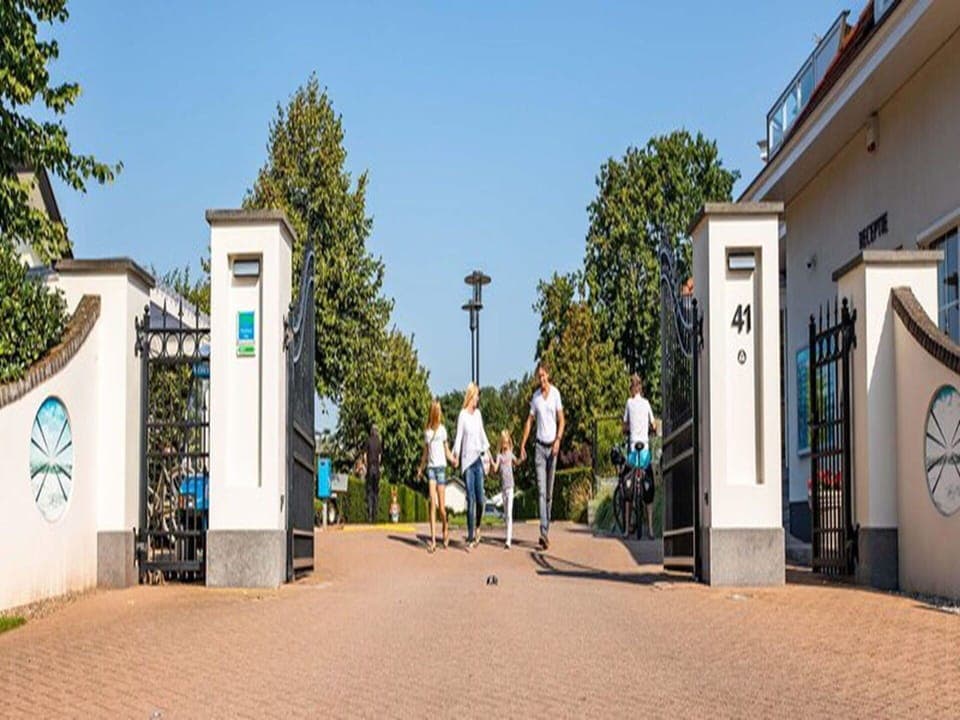 Sky, Building, Plant, Window, Tree, Road Surface, Asphalt, Residential Area, Urban Design, Facade