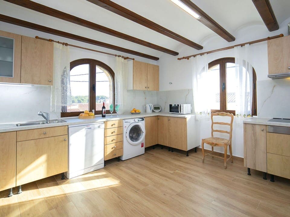 Flooring, Furniture, Interior Design, Wood, Floor, Cabinetry, Kitchen, Countertop, Room, Lighting