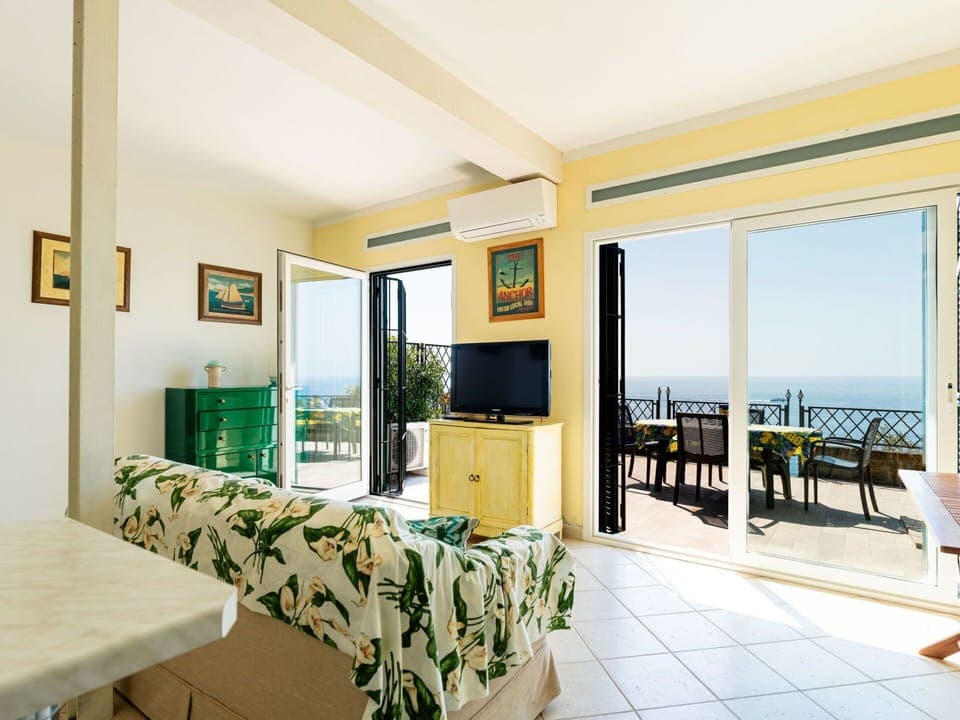 Sky, Property, Furniture, Table, Azure, Chair, Building, Window, Shade, Architecture