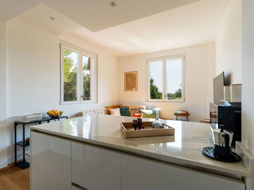 Sky, Property, Furniture, Table, Azure, Chair, Building, Window, Shade, Architecture