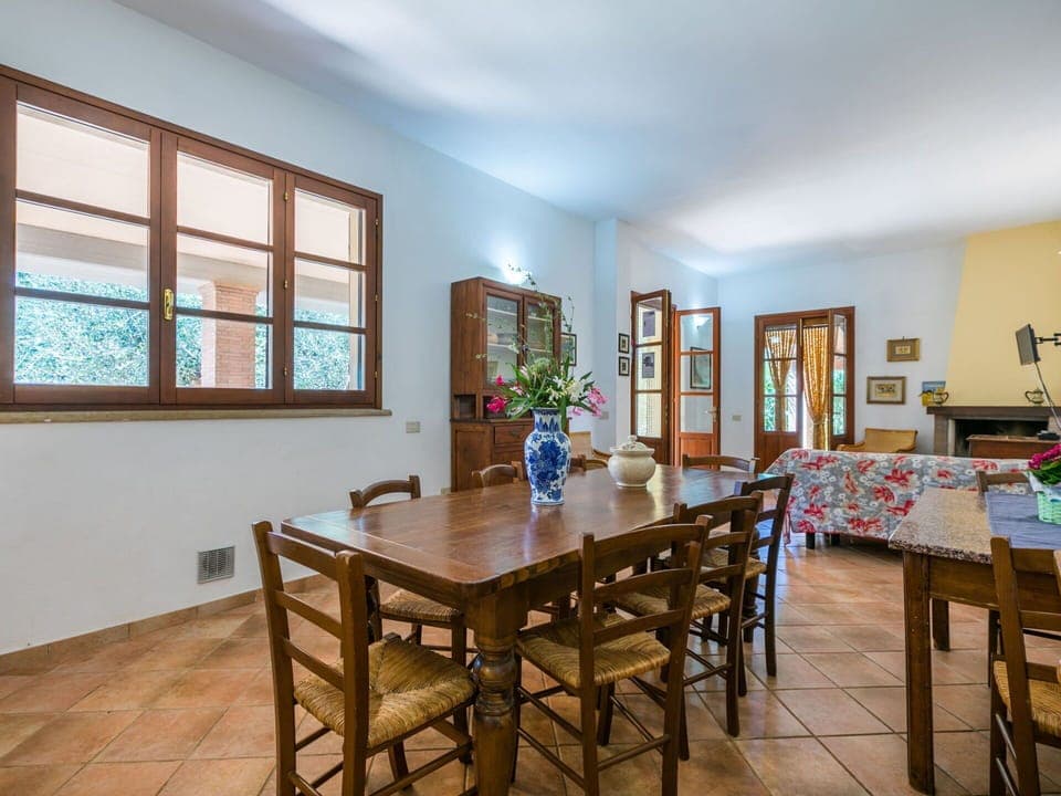 Sky, Property, Furniture, Table, Azure, Chair, Building, Window, Shade, Architecture