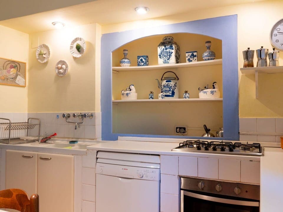 Cabinetry, Property, Building, Countertop, Shelf, Sink, Interior Design, Lighting, Drawer, Kitchen Stove