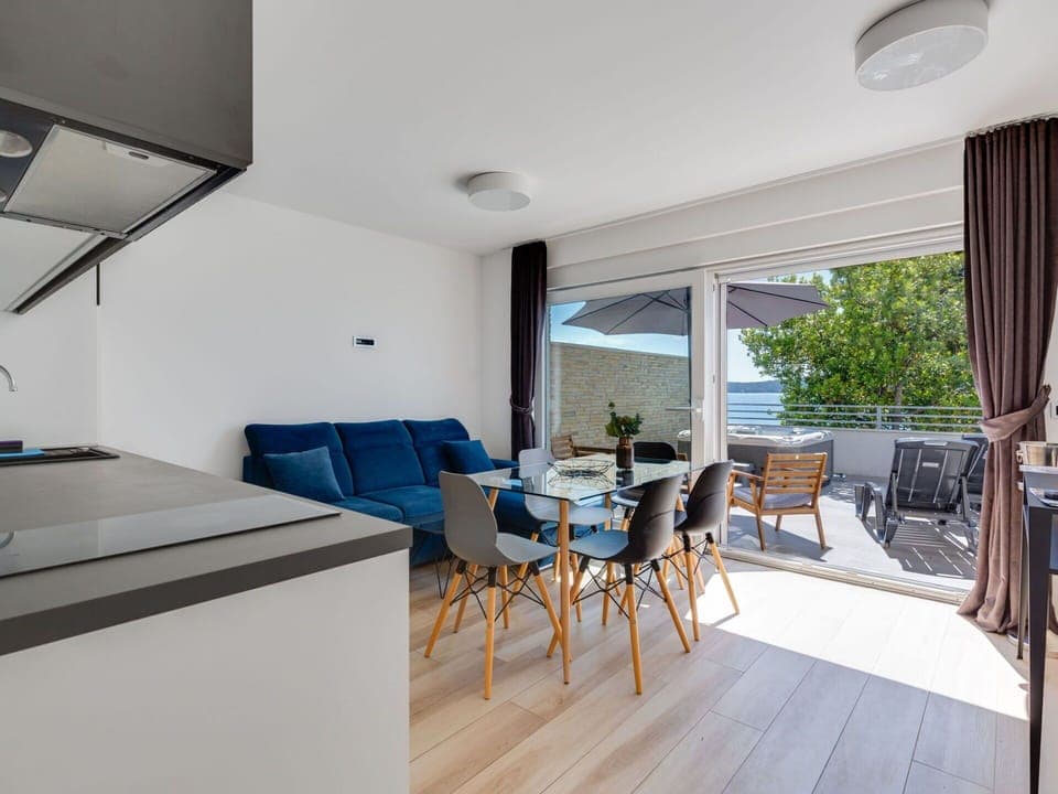 Furniture, Table, Chair, Building, Plant, Wood, Interior Design, Shade, Flooring, Window