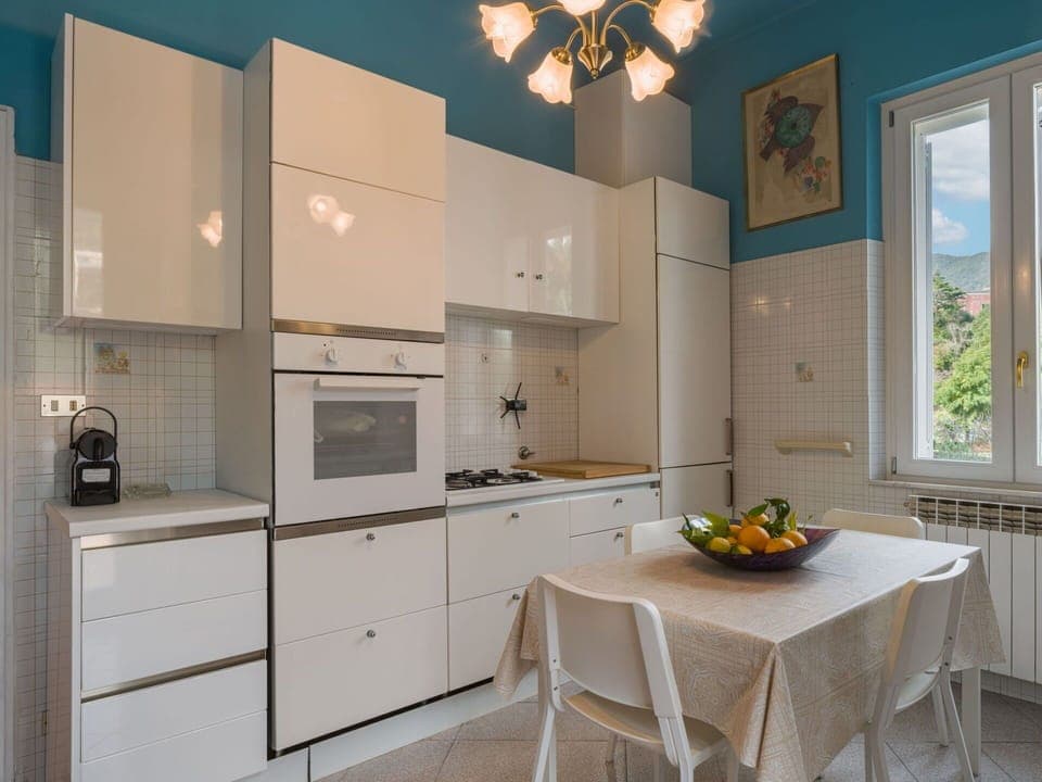 Kitchen, Kitchen Appliance, Interior Design, Countertop, Major Appliance, Flooring, Furniture, Cabinetry, Wood, Floor