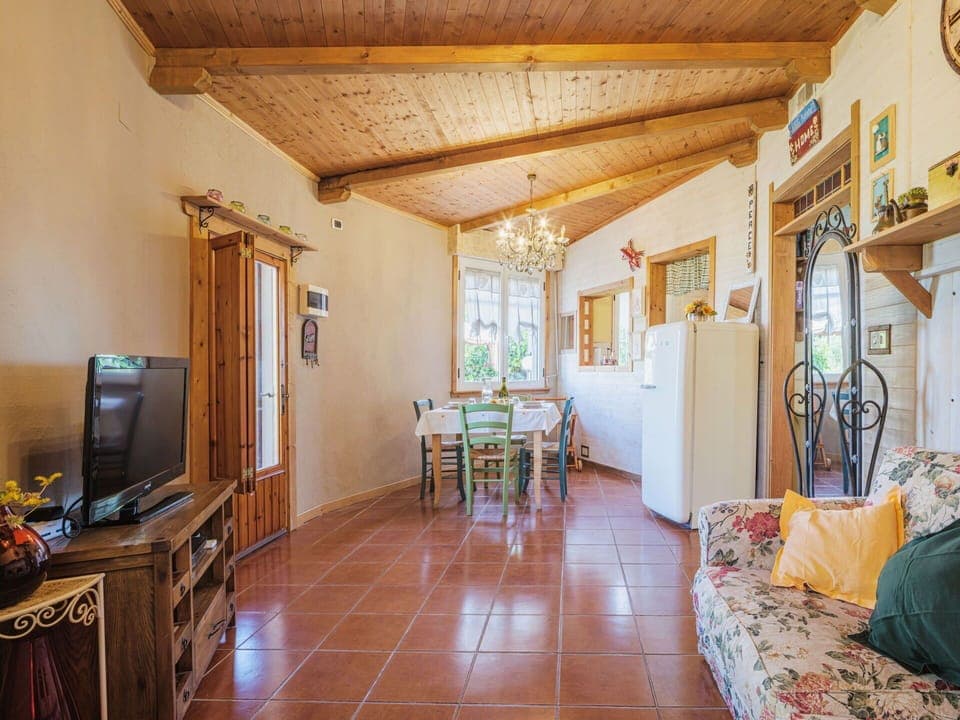 Cabinetry, Wood, Drawer, Interior Design, Door, Flooring, Table, Floor, Living Room, Building