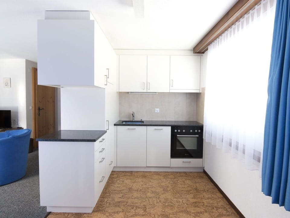 Cabinetry, Property, Furniture, Building, Countertop, Kitchen Stove, Curtain, House, Kitchen Appliance, Wood