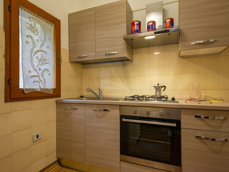 Cabinetry, Tap, Countertop, Property, Kitchen Sink, Sink, Building, Kitchen, Kitchen Stove, Wood