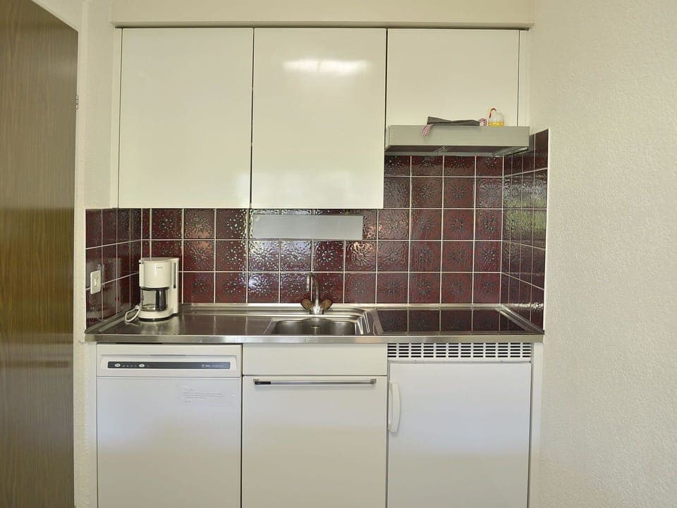 Tap, Cabinetry, Plumbing Fixture, Kitchen Sink, Countertop, Sink, Building, Kitchen, Interior Design, Wood