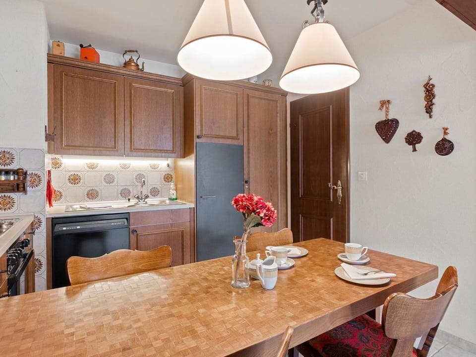 Table, Furniture, Property, Cabinetry, Countertop, Chair, Wood, Interior Design, Lighting, Flooring