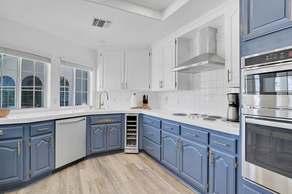 Large kitchen with dishwasher, wine cooler, cook top and double ovens