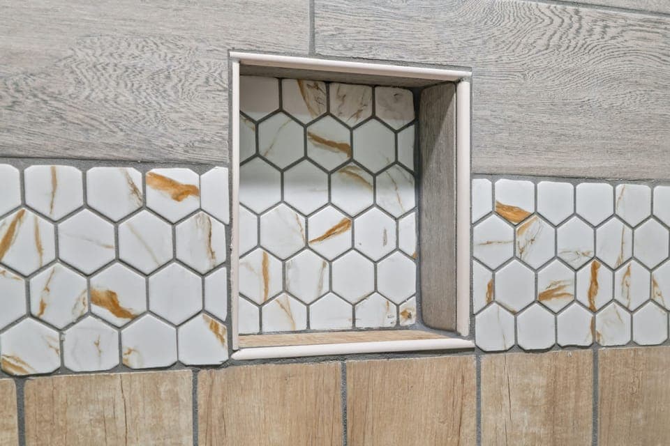 Bedroom 1 ensuite with dual sink, and separate shower & tub