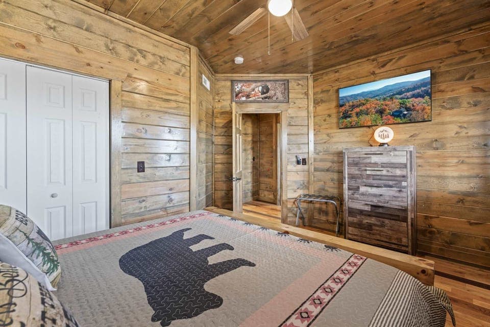 This king suite boasts a luxe private ensuite, Smart TV, & balcony access