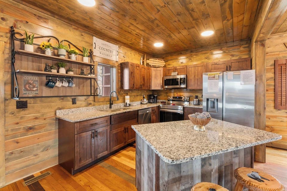 The inviting, open kitchen offers ample space & all the comforts of home