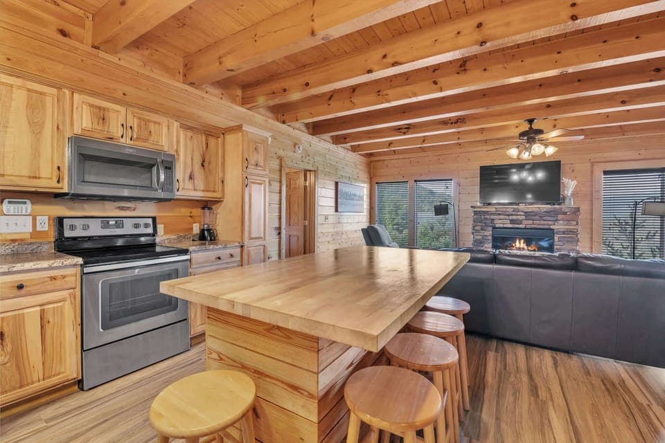 Sip morning coffee or grab a bite at the dual kitchen islands, with space for 11
