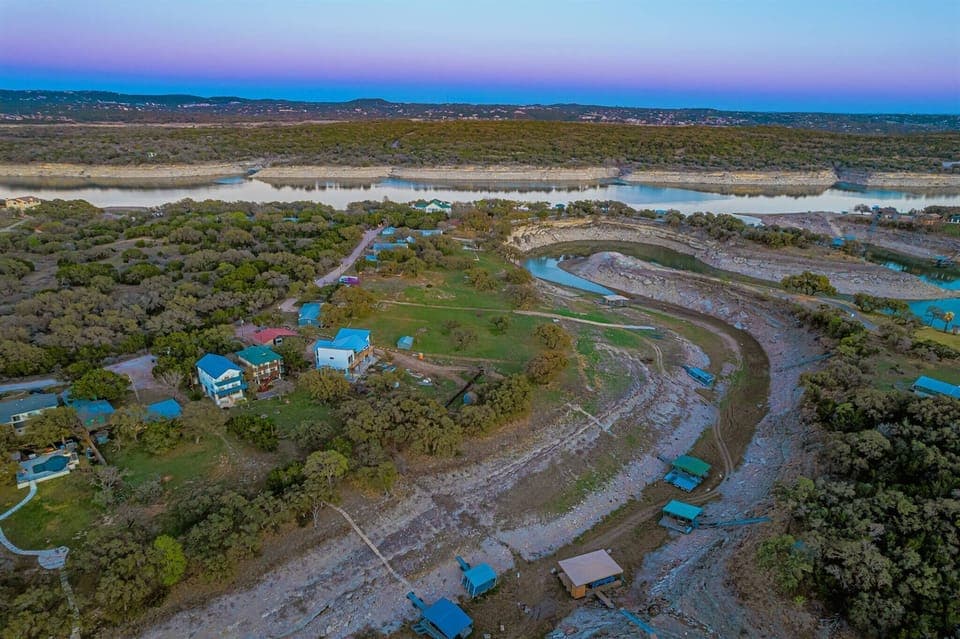 Dirt road leading to the private community