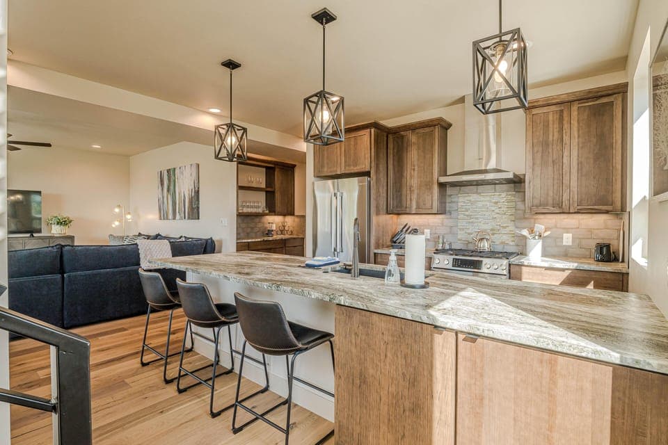 With ample counter space, additional bar seating, and abundant natural light, this space is perfect for gathering.