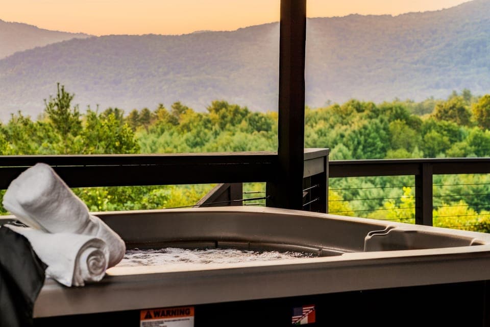 Take in the view from this hot tub that seats up to 6.