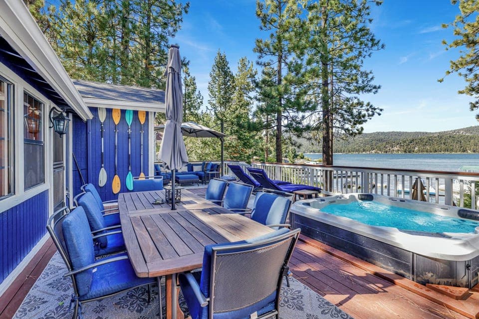 Private outdoor hot tub, surrounded by tall pines, perfect for relaxing under the trees after a day of adventure—enjoy peaceful forest views, fresh air, and a truly rejuvenating stay.