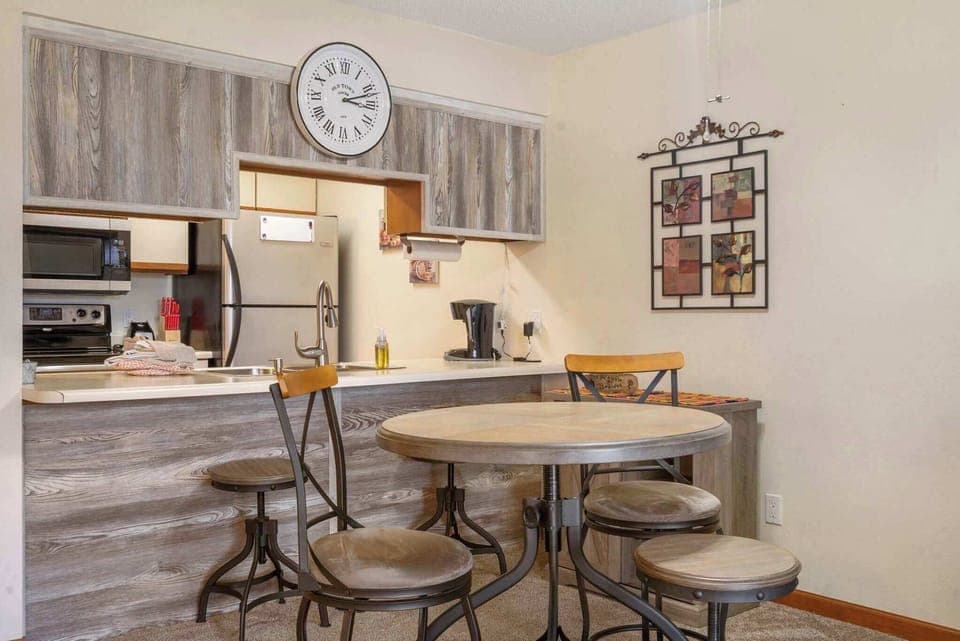 Lounge or enjoy a meal at the dining table, offering room for 4