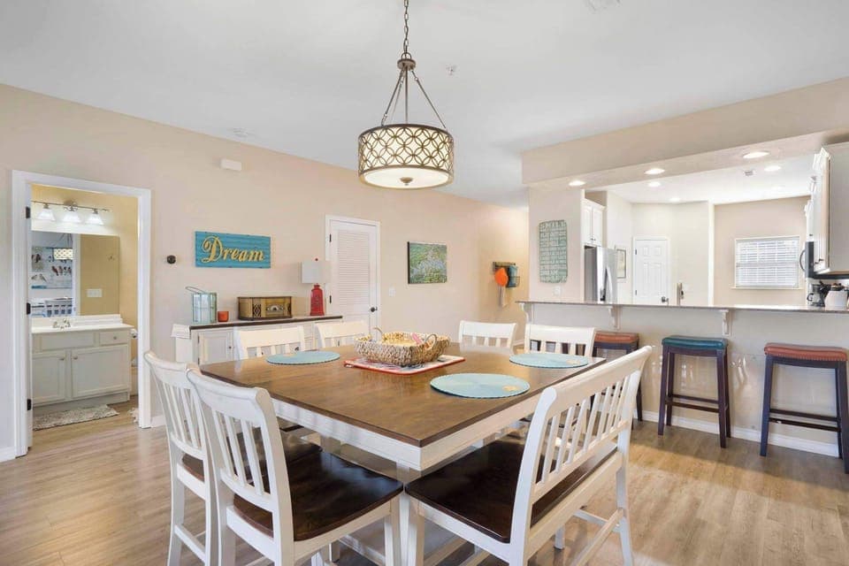 Unit #1 Dining table with seating for 8